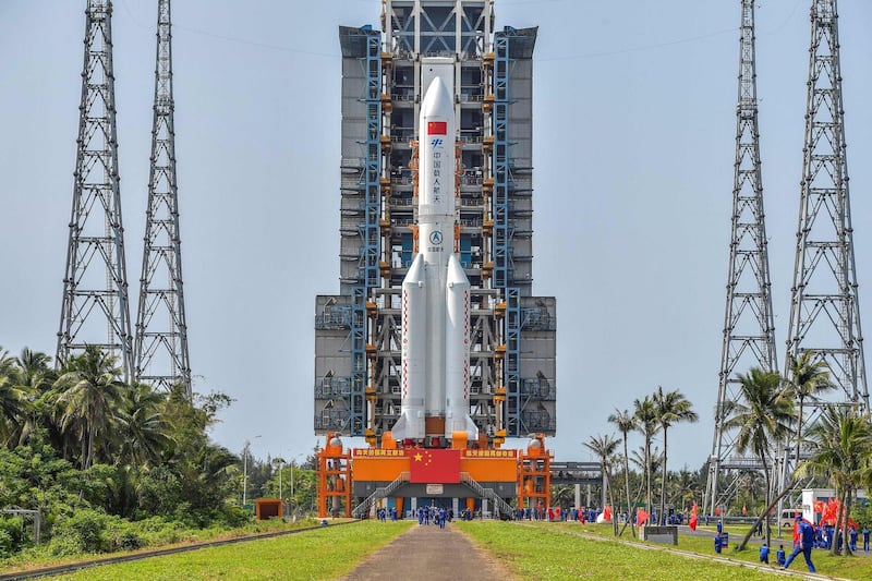This photo taken on April 23, 2021 shows the Long March 5B rocket, which is expected to launch China's Tianhe space station core module on April 29, at the Wenchang Spacecraft Launch Site in southern China's Hainan province. China OUT
 / AFP / China News Service (CNS) / STR
