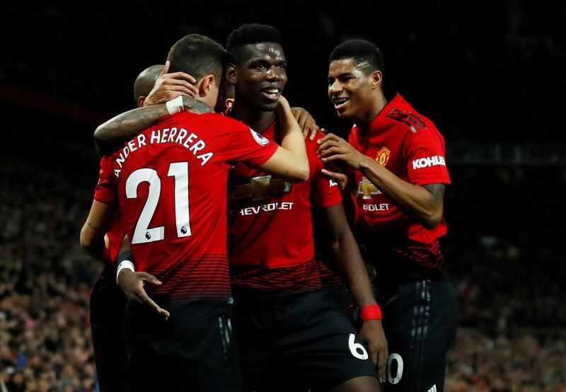 Manchester United's Paul Pogba celebrates with Ander Herrera and Marcus Rashford after scoring. Reuters