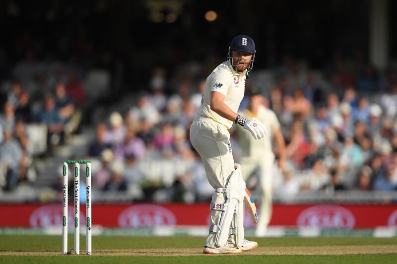 England's Jonny Bairstow looks back as he edges behind to Steve Smith of Australia and is out for 14. Getty