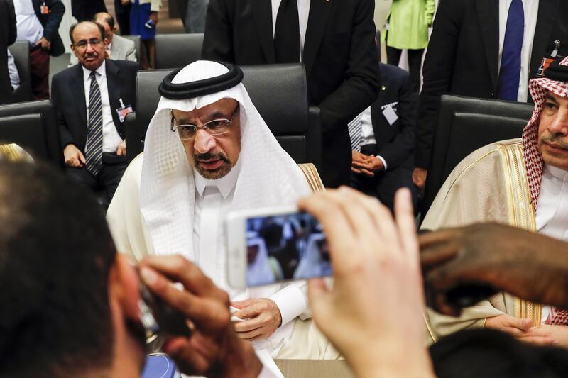Khalid Al-Falih, Saudi Arabia's energy and industry minister, center, speaks to reporters ahead of the 174th Organization Of Petroleum Exporting Countries (OPEC) meeting in Vienna, Austria, on Friday, June 22, 2018. OPEC and its allies reached a preliminary agreement in the face of strong opposition from Iran to boost production by a theoretical 1 million barrels a day - the actual increase will be smaller as several countries are unable to raise output. Photographer: Stefan Wermuth/Bloomberg