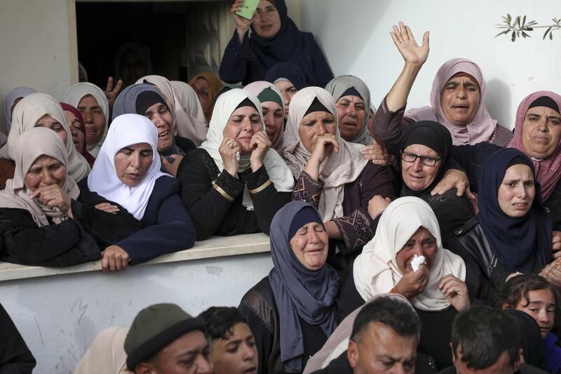 Palestinian women mourn during the funeral of Mohammed Hamayel. AFP