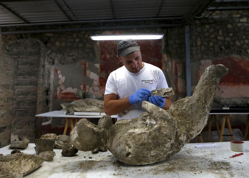 An expert team made up of archaeologists, radiologists, orthodontists and anthropologists began on September 2015 to use CAT scan technology (computerised axial tomography) to peer inside the plaster cast moulds of Pompeii’s victims. Alessandro Bianchi / Reuters