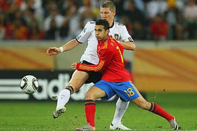 Pedro Rodriguez, front, earned his place in the semi-final against Germany and would have scored Spain's second goal of the match if not an error in judgement. The Canary Islander has nevertheless improved and made Vicente Del Bosque, his coach, a happy man.