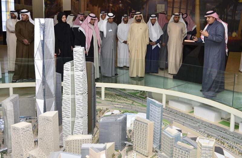 Sheikh Mohammed bin Rashid, Vice President and Ruler of Dubai, visits King Abdullah Financial District (KAFD) in Riyadh and views a miniature of the complex. Sheikh Mohammed is in Riyadh to participate in the 36th GCC summit.