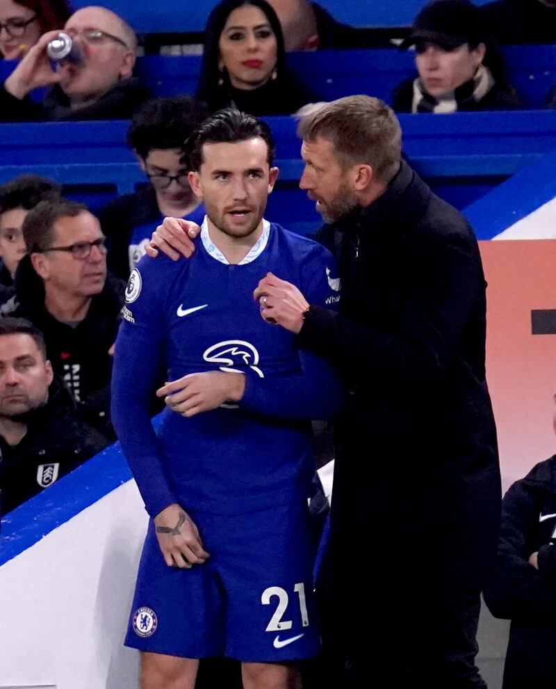 Chelsea manager Graham Potter speaks to Ben Chilwell at Stamford Bridge. PA