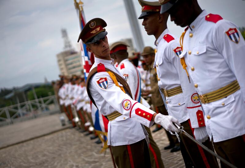 Cuban honour guards get into position before Prince Charles and Camilla arrive for a wreath-laying ceremony at the Jose Marti Monument during their official visit to Havana. AP
