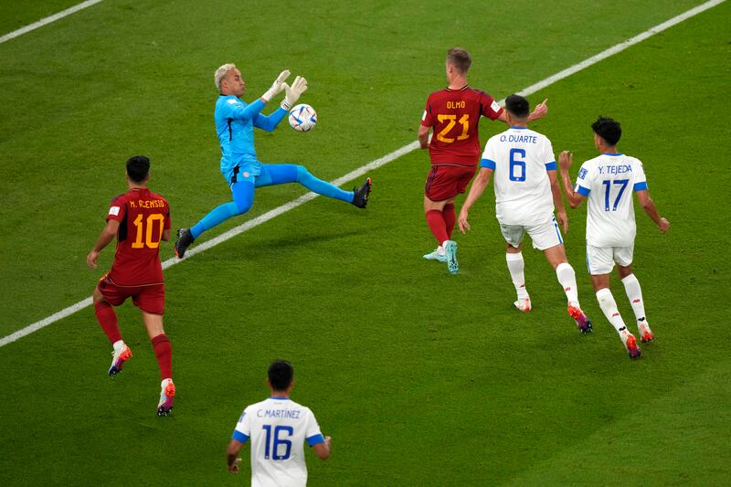 Spain's Dani Olmo scores his side's opening goal. AP 