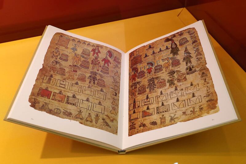 ABU DHABI ,  UNITED ARAB EMIRATES , May 13 – 2019 :- Ancient Mexican artefacts called Codices of Mexico: The Old Books of the New World on display at Qasr Al Watan Library in Abu Dhabi. This one is Matricula de Tributos , Facsimile of the original , Amate paper and pigments. ( Pawan Singh / The National ) For Arts & Life. Story by Katy Gillett