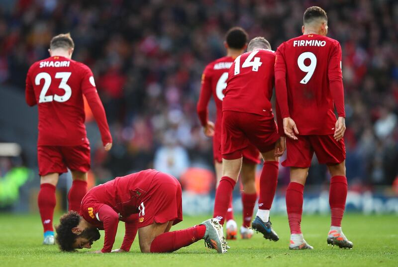 LIVERPOOL, ENGLAND - DECEMBER 14: Mohamed Salah of Liverpool celebrates after scoring his teams first goal during the Premier League match between Liverpool FC and Watford FC at Anfield on December 14, 2019 in Liverpool, United Kingdom. (Photo by Clive Brunskill/Getty Images)