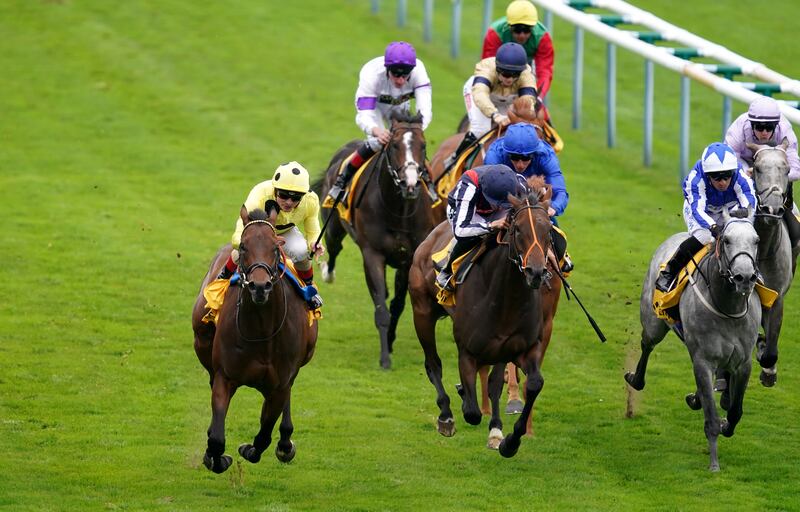 Emaraaty Ana, front left, ridden by Andrea Atzeni en route to winning the Sprint Cup Stakes on Saturday. PA
