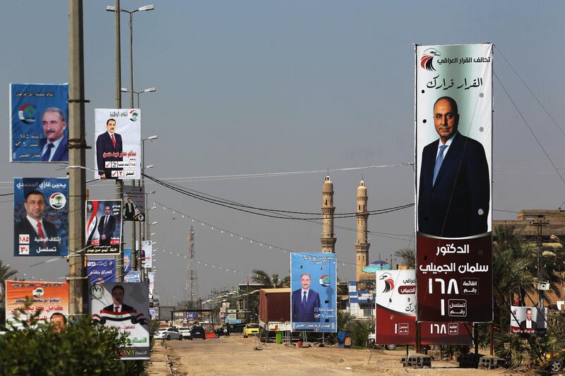 This picture taken on April 24, 2018, shows electoral posters ahead of the parliamentary elections to be held on May 12, in Fallujah.
Only a decade after Iraq's first ever multi-party elections, many disenchanted Iraqis say "the same old faces" with their own vested interests have been running the show since the fall of dictator Saddam Hussein. Iraqis are on May 12 to elect 320 deputies from a field of around 7,000 candidates, with 71 seats reserved for the capital. / AFP PHOTO / AHMAD AL-RUBAYE / TO GO WITH AFP STORY by AMMAR KARIM