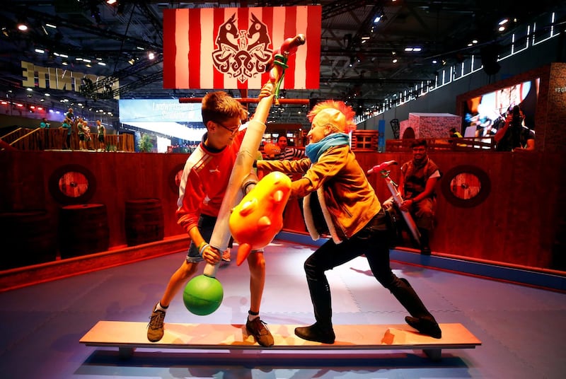 Children play during the media day of the world's largest computer games fair Gamescom in Cologne, Germany. Reuters