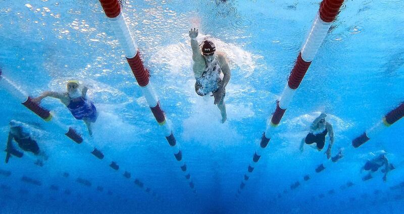 Katie Ledecky, centre, leads Kathryn McLaughlin, left, and Madisyn Cox, right, to win the women's 200m freestyle final at the TYR Pro Swim Series at San Antonio, Texas, on Friday, March 5. AFP