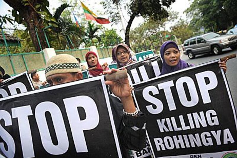 Indonesian Muslims rally outside the Myanmar embassy in Jakarta yesterday.