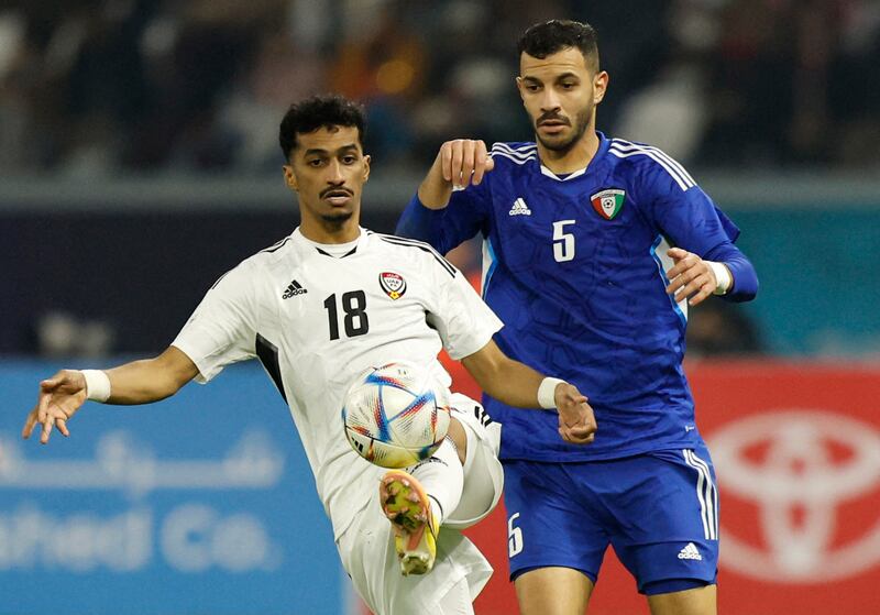 UAE's' Abdullah Ramadan in action with Kuwait's Fahad Al Hajeri. Reuters