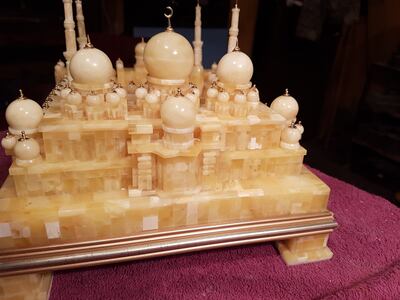 Tomasz Oldziejewski has hand-carved a replica of Sheikh Zayed Mosque, a map of the UAE and ships using amber. Photo: Tomasz Oldziejewski