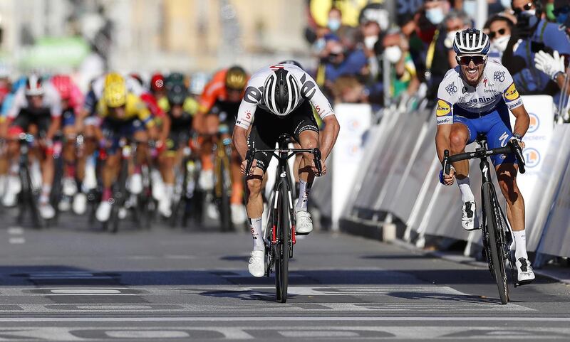 Julian Alaphilippe crosses the finish line to win Stage 2. EPA