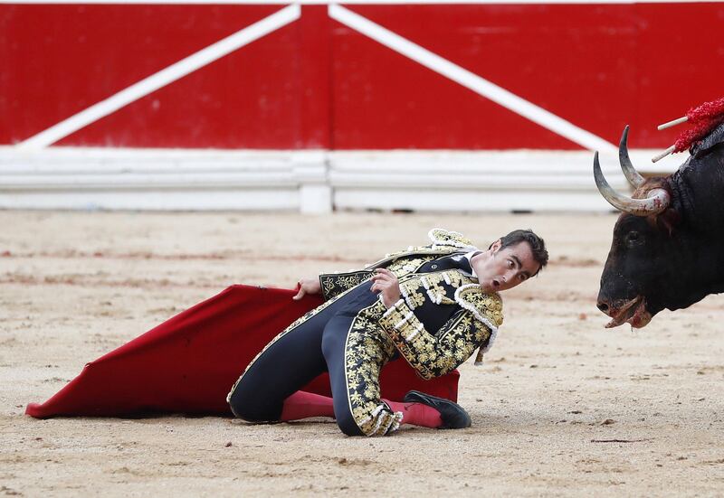 Spanish bullfighter David Fandila 'El Fandi' faces his second bull of the evening during the fourth bullfight of the Festival of San Fermin in Pamplona, Spain. The festival, locally known as Sanfermines, is held annually from 06 to 14 July in commemoration of the city's patron saint.  EPA / Javier Lizon