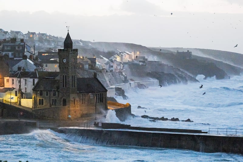 Waves hits Porthleven in Cornwall, south-west England. Winds of 148 kilometres an hour were recorded further east along the coast. PA