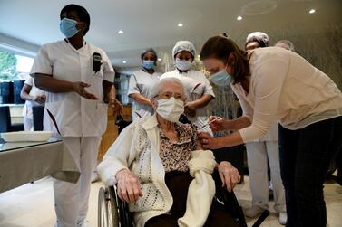 A care home resident gets a Pfizer dose in Brussels. Reuters 