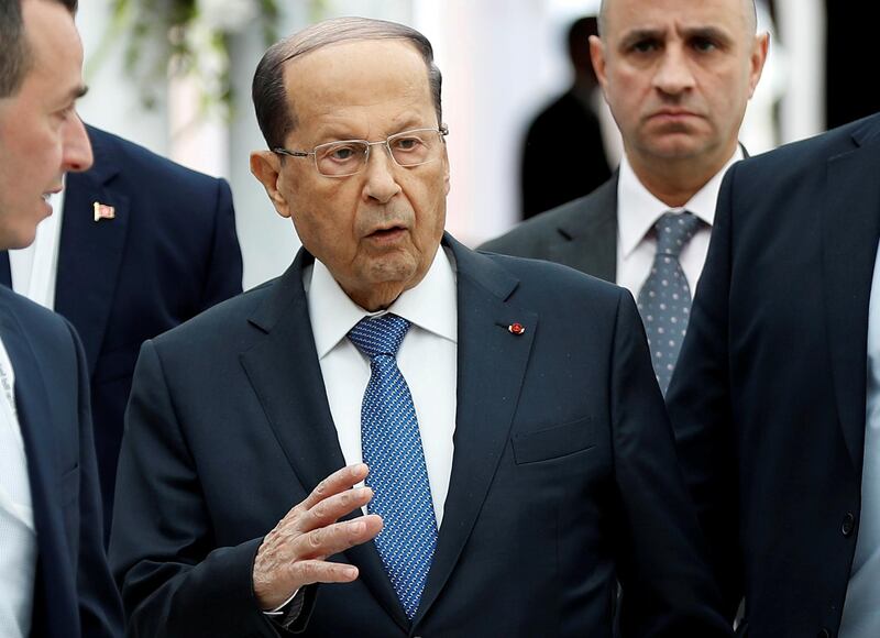 FILE PHOTO: Lebanese President Michel Aoun, gestures upon his arrival at Tunis-Carthage International Airport to attend the Arab Summit, in Tunis, Tunisia March 30, 2019. Hussein Malla/Pool via REUTERS/File Photo