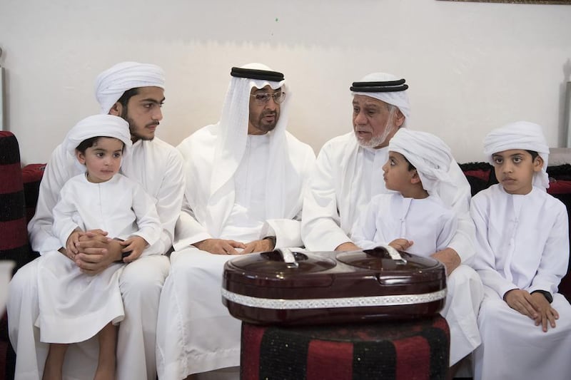 Sheikh Mohammed bin Zayed, Crown Prince of Abu Dhabi and Deputy Supreme Commander of the Armed Forces, offers condolences to Mohammed Eissa Al Hammadi (3rd R), father of Sgt Abdullah Mohamed Eissa Al Hammadi. Hamad Al Kaabi / Crown Prince Court — Abu Dhabi