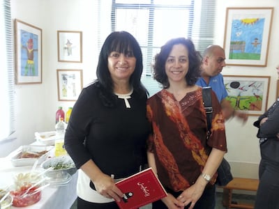 Melissa, right, with Persepolis Haifa School library.