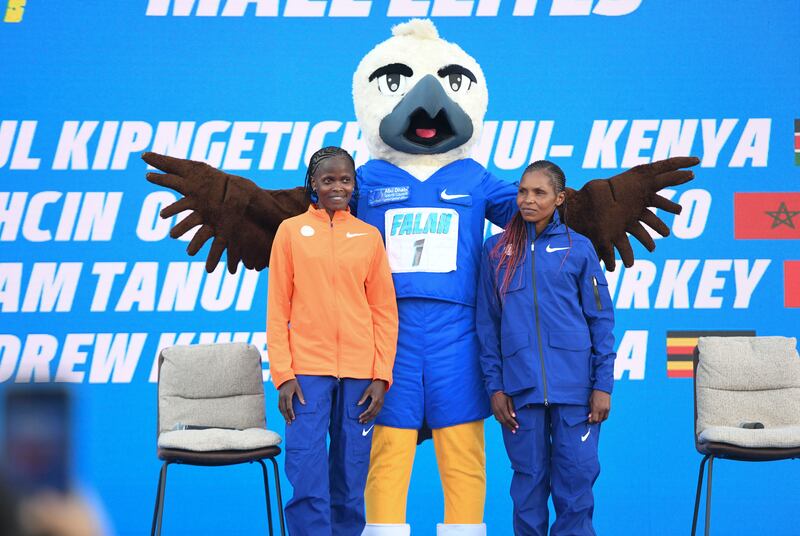 From left, Brigid Kosgei, Kenyan long distance runner and Emily Kipchumba, Kenyan during the press conference for the upcoming Abu Dhabi Marathon, Abu Dhabi.  Khushnum Bhandari / The National
