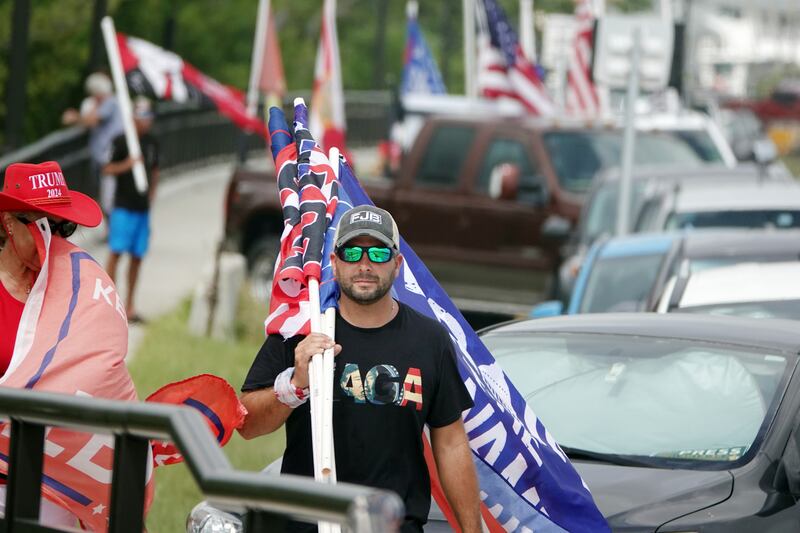 Supporters of former US president Donald Trump protest against the FBI raid at Mar-a-Lago in Palm Beach, Florida. South Florida Sun-Sentinel / AP