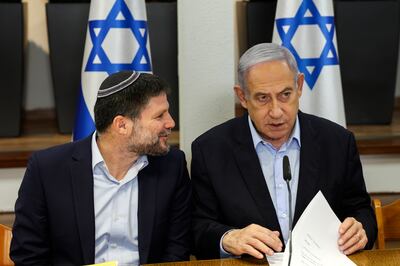 Israeli Prime Minister Benjamin Netanyahu (R) with Finance Minister Bezalel Smotrich, a high-profile settler. EPA
