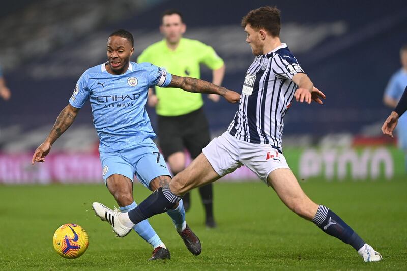 Manchester City's Raheem Sterling vies with West Bromwich Albion's Irish defender Dara O'Shea..