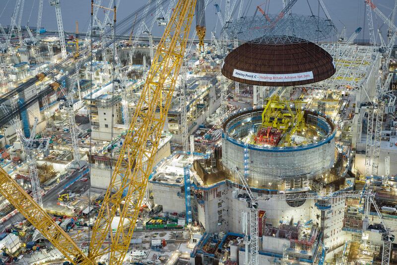 A dome is lifted into place at Britain's Hinkley Point C site, a nuclear plant under construction with the help of the world's largest crane Big Carl. AFP