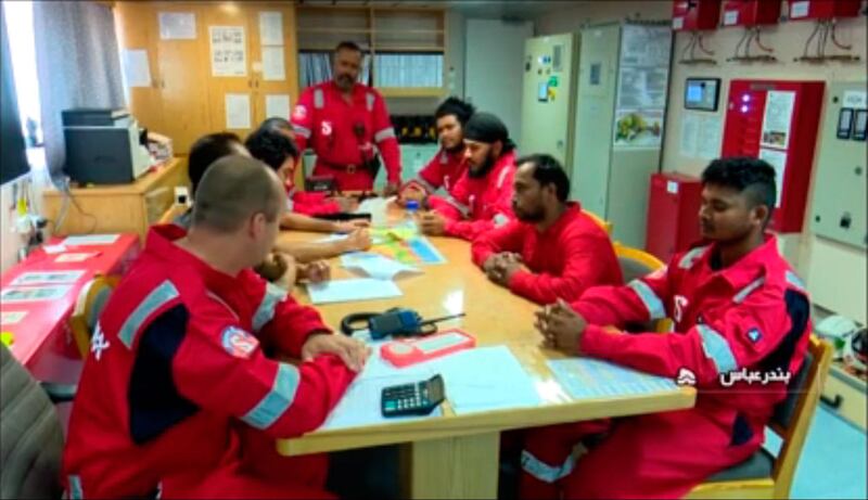 An image grab taken from a broadcast by Islamic Republic of Iran Broadcasting (IRIB) on July 22, 2019 shows crew members of the British-flagged tanker Stena Impero, after it was seized by Iran's Revolutionary Guard Corps. Britain on July 23, said it was planning a European-led protection force for shipping in the Gulf after Iranian authorities seized a British-flagged tanker in a dramatic escalation of tensions in the region. In a ramping up of tensions, the Islamic Revolutionary Guard Corps seized the Stena Impero on July 19 in the Gulf's strategic Strait of Hormuz. / AFP / IRIB / - / RESTRICTED TO EDITORIAL USE - MANDATORY CREDIT "AFP PHOTO / HO / IRIB" - NO MARKETING NO ADVERTISING CAMPAIGNS - DISTRIBUTED AS A SERVICE TO CLIENTS  / NO RESALE - NO BBC PERSIAN / NO VOA PERSIAN / NO MANOTO TV
