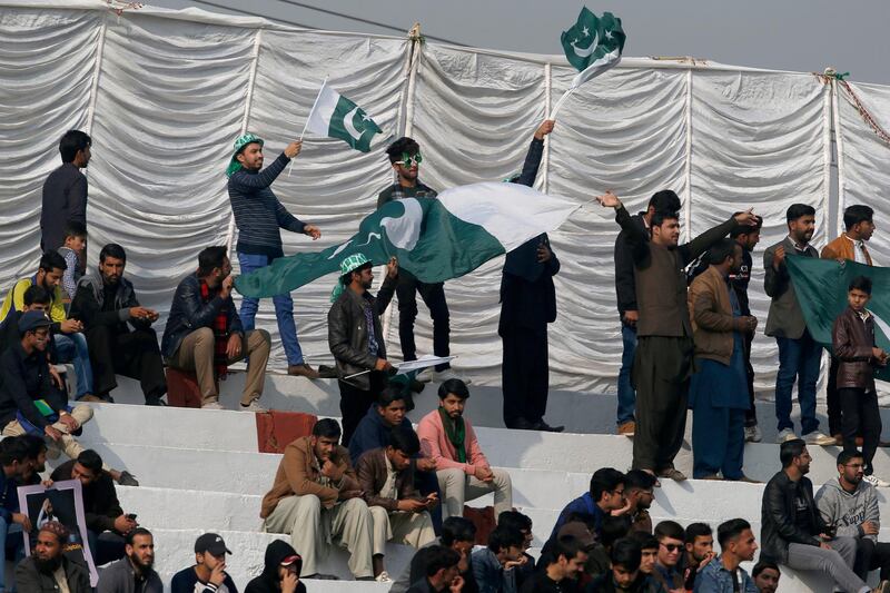 Fans at the pindi Cricket Stadium watch the first Test in Pakistan in a decade. AP