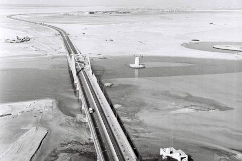 An aerial shot of the empty land of Abu Dhabi, and the road (or  bridge) that was a beginning to Abu Dhabi's future. 

Courtesy Al Ittihad 