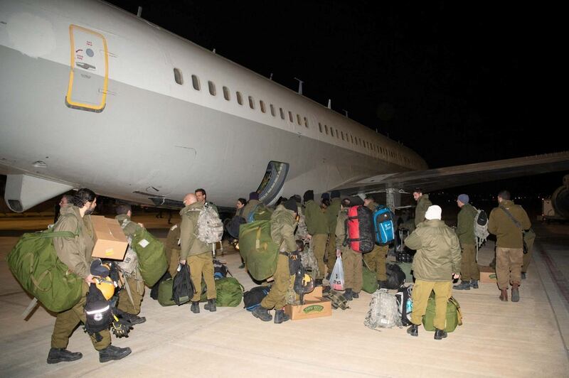 Members of The Olive Branches humanitarian aid delegation of the Israel Defence Forces prepare to fly from Israel to Turkey to assist in earthquake-stricken south. Reuters