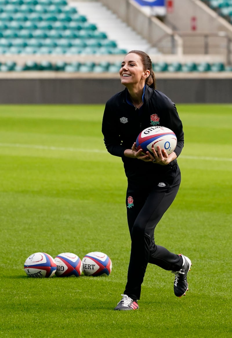 During the training, the Duchess of Cambridge also scored a try, threw the ball around and even practiced a scrum. AP Photo