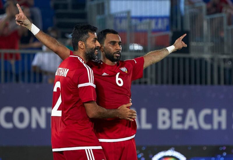 Kamal Ali, right, and Haitham Al Kaabi celebrate during the UAE's Intercontinental Beach Soccer Cup win over Italy. Courtesy Manuel Queimadelos Alonso / beachsoccer.com