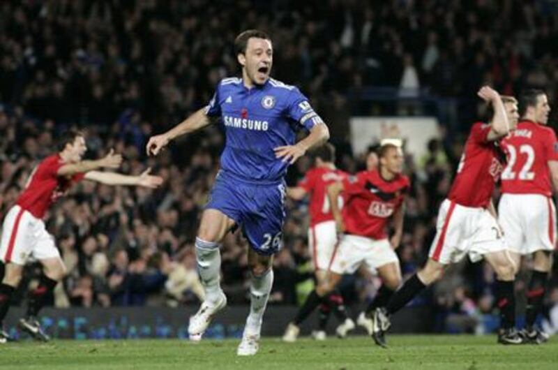 The Chelsea captain John Terry celebrates his winner as Manchester United run to the referee to protest at Stamford Bridge on Sunday.