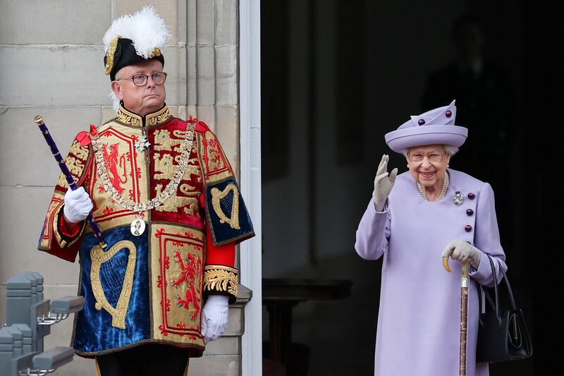 Queen Elizabeth used a walking stick as she arrived. Reuters