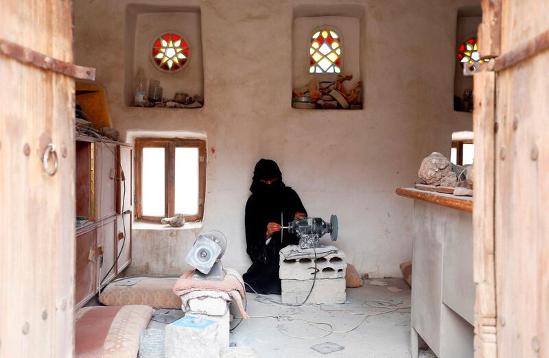 Safa al-Faqih crafts a stone in the old city of the capital, Sanaa, on April 18, 2018. Mohammed Huwais / AFP Photo