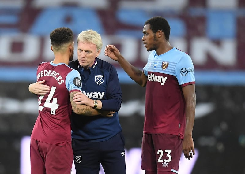 West Ham manager David Moyes (C) congratulates Ryan Fredericks (L) and Issa Diop (R) at the end of the match. EPA