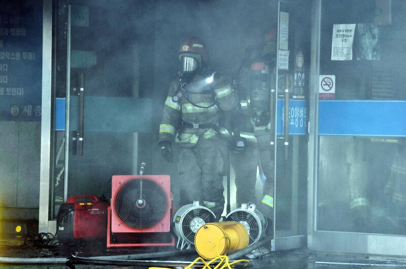 South Korean firefighters at the scene. Kim Gu-Yeon/ Gyeongnam Domin Ilbo via Getty Images