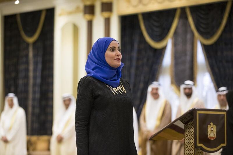 Ohood Al Roumi, Minister of State for Happiness, gives an oath during a swearing-in ceremony for the Cabinet ministers.