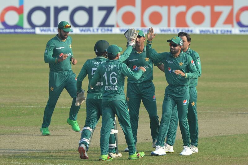 Pakistan's players celebrates after the dismissal of Afif Hossain. AFP