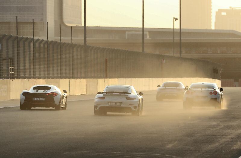 DUBAI, UNITED ARAB EMIRATES, August 31 – 2018 :- Members and Guests of the Ninth Degree supercars club driving their cars during the Ninth Degree supercars club meet held at Dubai Autodrome in Dubai. ( Pawan Singh / The National )  For Motoring. Story by Adam Workman