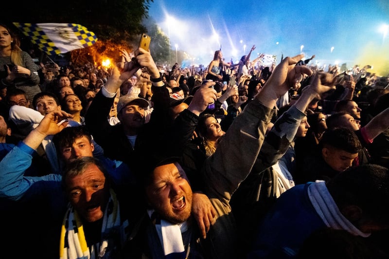 Leeds United supporters celebrate. Getty