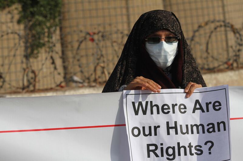 Activists gather in front of the UN office in Herat, Afghanistan, to demand peace and an end to war. EPA