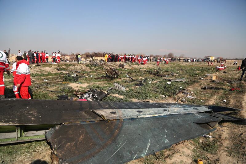 TEHRAN, IRAN - JANUARY 08: Search and rescue works are conducted at site after a Boeing 737 plane belonging to a Ukrainian airline crashed near Imam Khomeini Airport in Iran just after takeoff with 180 passengers on board in Tehran, Iran on January 08, 2020. All 167 passengers and nine crew members on an Ukrainian 737 plane that crashed near Iran's capital Tehran early Wednesday have died, according to a state official. (Photo by Fatemeh Bahrami/Anadolu Agency via Getty Images)