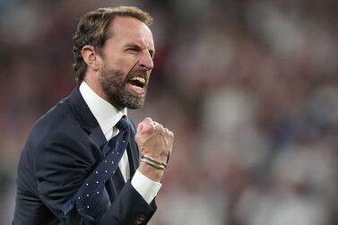 England's coach Gareth Southgate celebrates after winning the UEFA EURO 2020 semi-final football match between England and Denmark at Wembley Stadium in London on July 7, 2021.  (Photo by Frank Augstein  /  POOL  /  AFP)